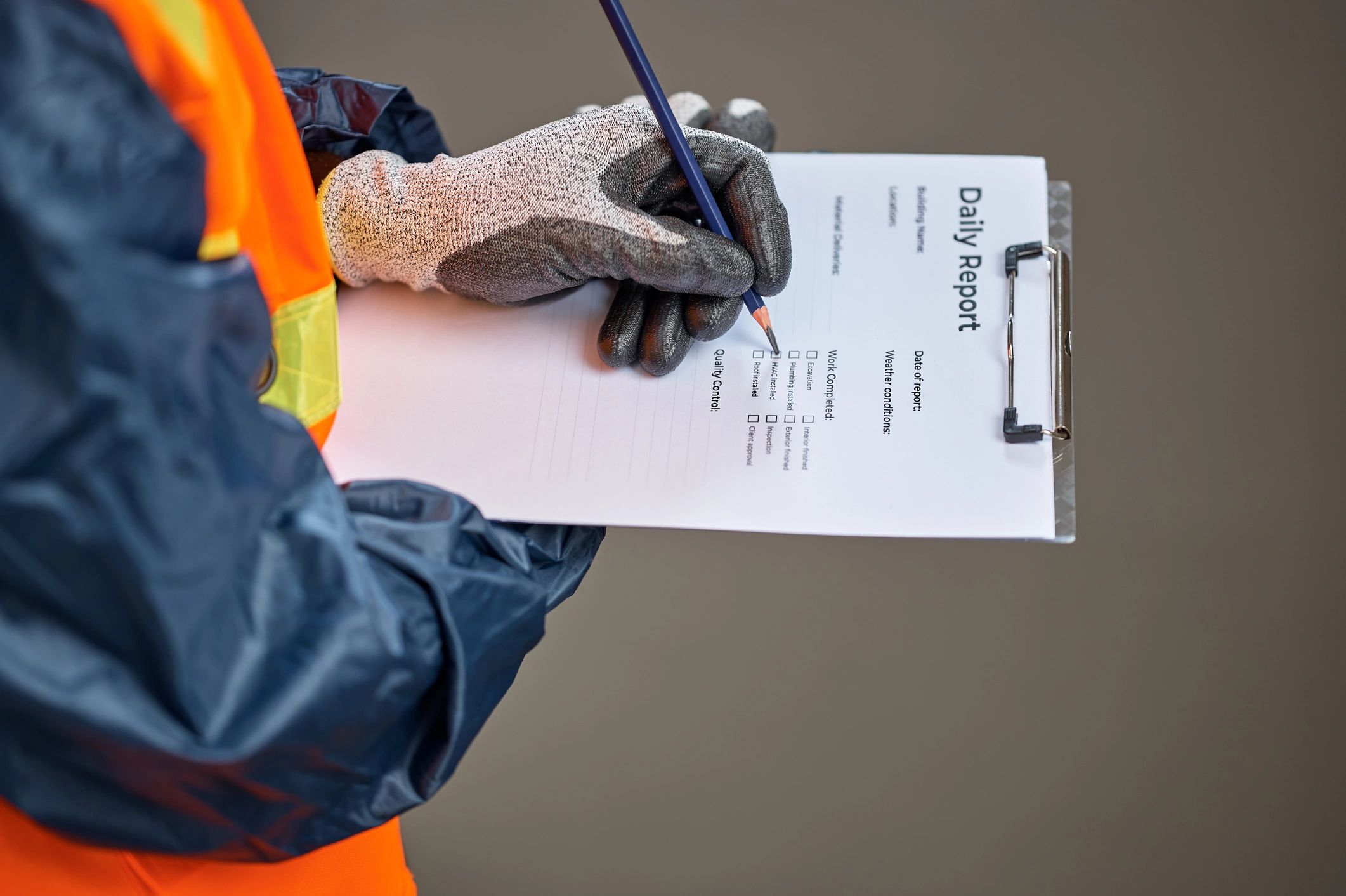 Candidate completing assessment checklist and documentation